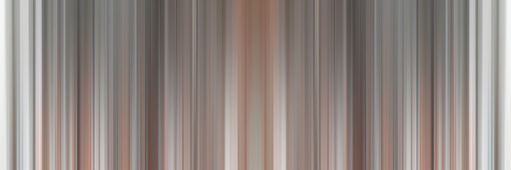 Abstract vertical lines background. Streaks are blurry in motion.