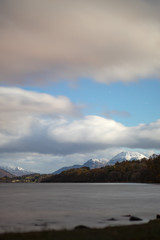 The snow topped Ben Lomond dominating the lower landscape of Loch Lomond the largest fresh water source in UK