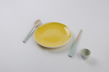 empty plate with spoon and plate