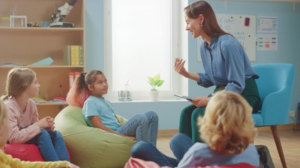 Caring teacher with tablet in class - Powered by Adobe