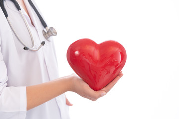 Doctor holding a red heart