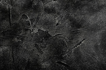 Naklejka premium Black marble or cracked concrete background (as an abstract black background or marble or concrete texture)