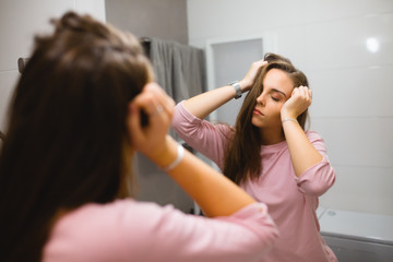 lazy and sleepy woman in bathroom