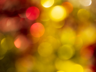 Christmas light background. Holiday glowing backdrop. Defocused Background. Blurred Bokeh.