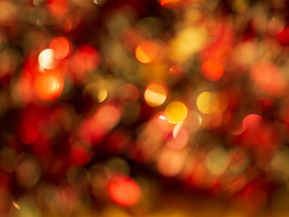 Christmas light background. Holiday glowing backdrop. Defocused Background. Blurred Bokeh.