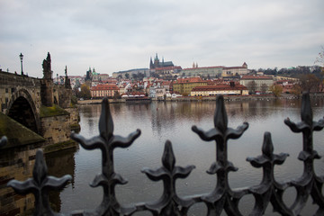  A masterpiece of architecture the famous Charles Bridge in the city of Prague, Czech Republic, on a cloudy morning on the eve of Christmas.