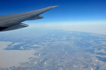 In flight picture from the window of a Boeing 777 over the city of  Saint Petersburg