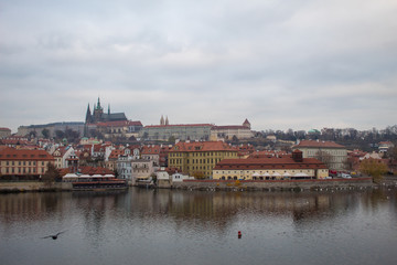 Naklejka na ściany i meble Panorama of the old Prague Castle from Charles Bridge of the Czech capital Prague.