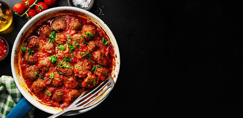 Meatballs with tomato sauce served in pan