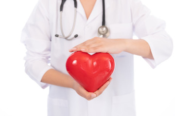 Doctor holding a red heart