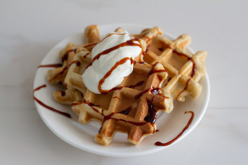 sweet wafers with yogurt and syrup