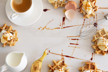 waffles with syrup and baking ingredients and place for text