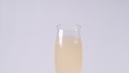 Champagne glass on a white background
