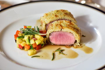 Beef fillet in a roll with vegetable