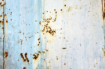 Metal texture with scratches and cracks which can be used as a background. Grunge texture of old rusty metal