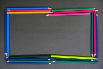 random pencil colors in rectangle shape  on black background