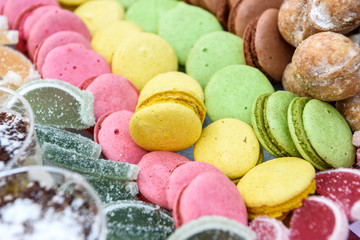 Food. Desserts. Sweet cakes on furshet table in restaurant close up