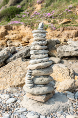 Pyramid of stones on the sea