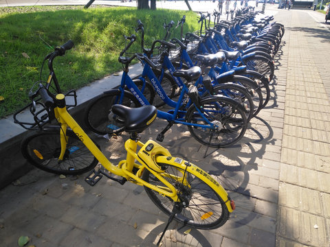ZHONGSHAN GUANGDONG China-October 4 2018:Didi and OFO shared bikes on the side of the road in day time-sharing is very popular in China.