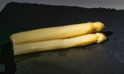 White asparagus in different materials