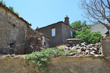 Ruined house in the abandoned Greek village Derekoy (Schinoudi) - turkish aegean island Gokceada