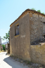 Ruined house in the abandoned Greek village Derekoy (Schinoudi) - turkish aegean island Gokceada