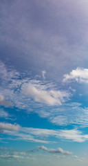 Fantastic clouds against blue sky, panorama