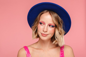 Close up of a lovely young blonde girl with bright makeup