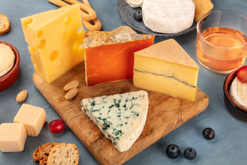 Cheese platter. Blue cheese, red Leicester, Brie, Emmental and others with wine