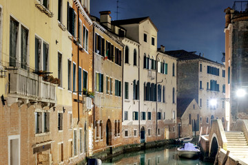 Fototapeta na wymiar Night view of a traditional Venetian house facades