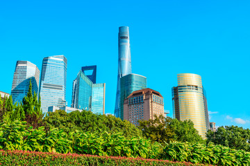 Obraz premium Urban architectural landscape and green plants in Shanghai