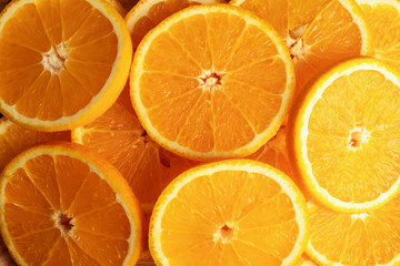 backgrounds and textured of orange fruits sliced into piece