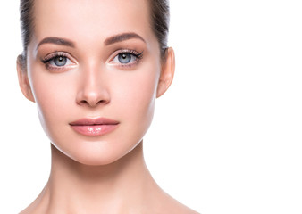 Beautiful woman face natural make up healthy skin close up beauty eyes