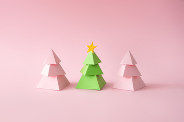 Naklejka na ściany i meble Christmas composition. Pink and green Christmas trees on pink background. Happy holidays. new year minimal concept.