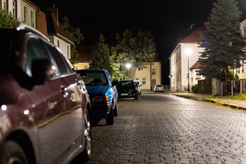 car on street in city in the night