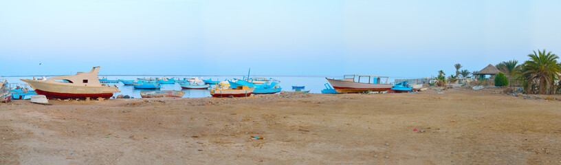Marina Safaga. Egypt. Fishing boats in the evening. Panorama.