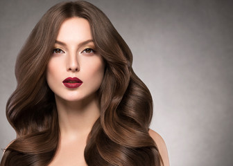Fototapeta premium Curly hair woman beauty makeup female healthy hairstyle fashion make up brunette