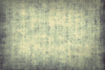 Grunge weathered vintage damaged parchment paper or sackcloth burlap texture background design