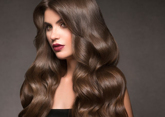 Beautiful hair woman long curly hairstyle macro face natural makeup