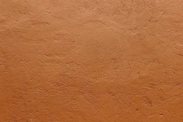 Fotobehang Donkere terracotta gips ruwe muur textuur achtergrond © OldskoolPhotography