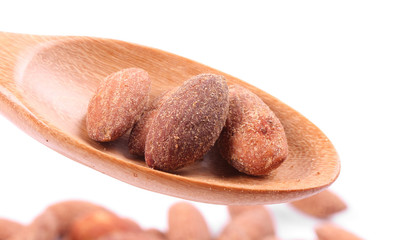 Almonds In Wooden Spoon On White Background