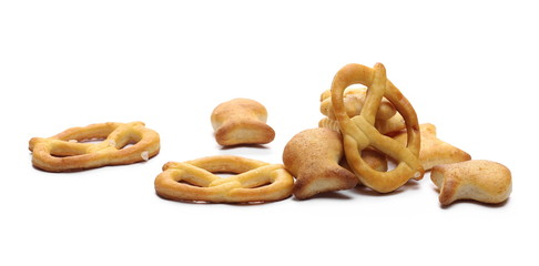 Salty cracker and pretzel snacks, party mix isolated on white background