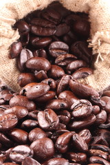 Coffee beans in bag isolated on white background