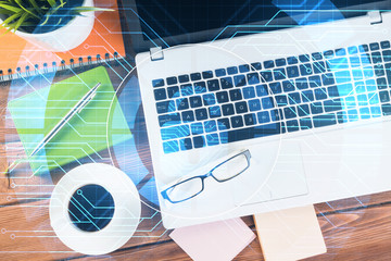 Business workplace with laptop coffee cup and security concept on screen