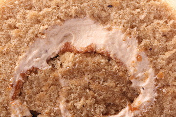 Coffee roll cake with coffee beans