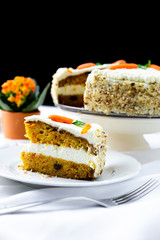 Carrot cake on a white table