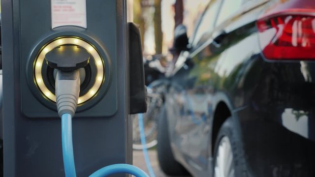 Street charging for an electric vehicle where a car is charging