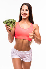 Fitness woman holding broccoli isolated on white background