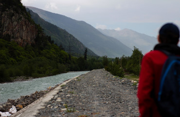 Man with backpack. hiking in mountains. Travel, Lifestyle.