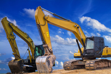 yellow excavator at work